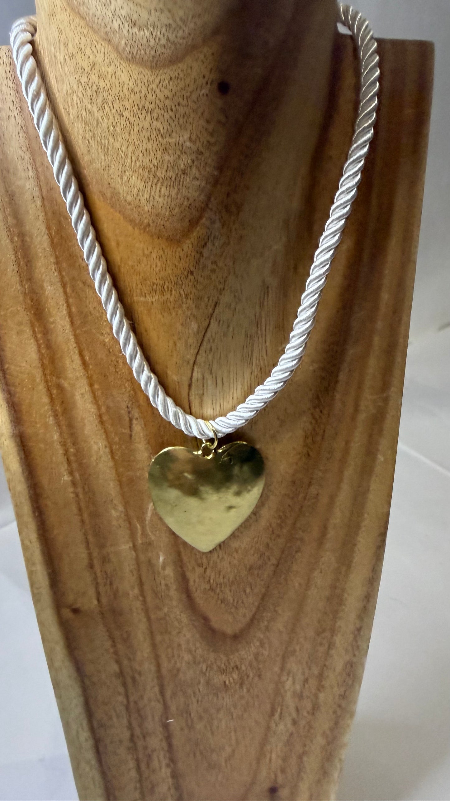 The Gold Heart Necklace On White Rope