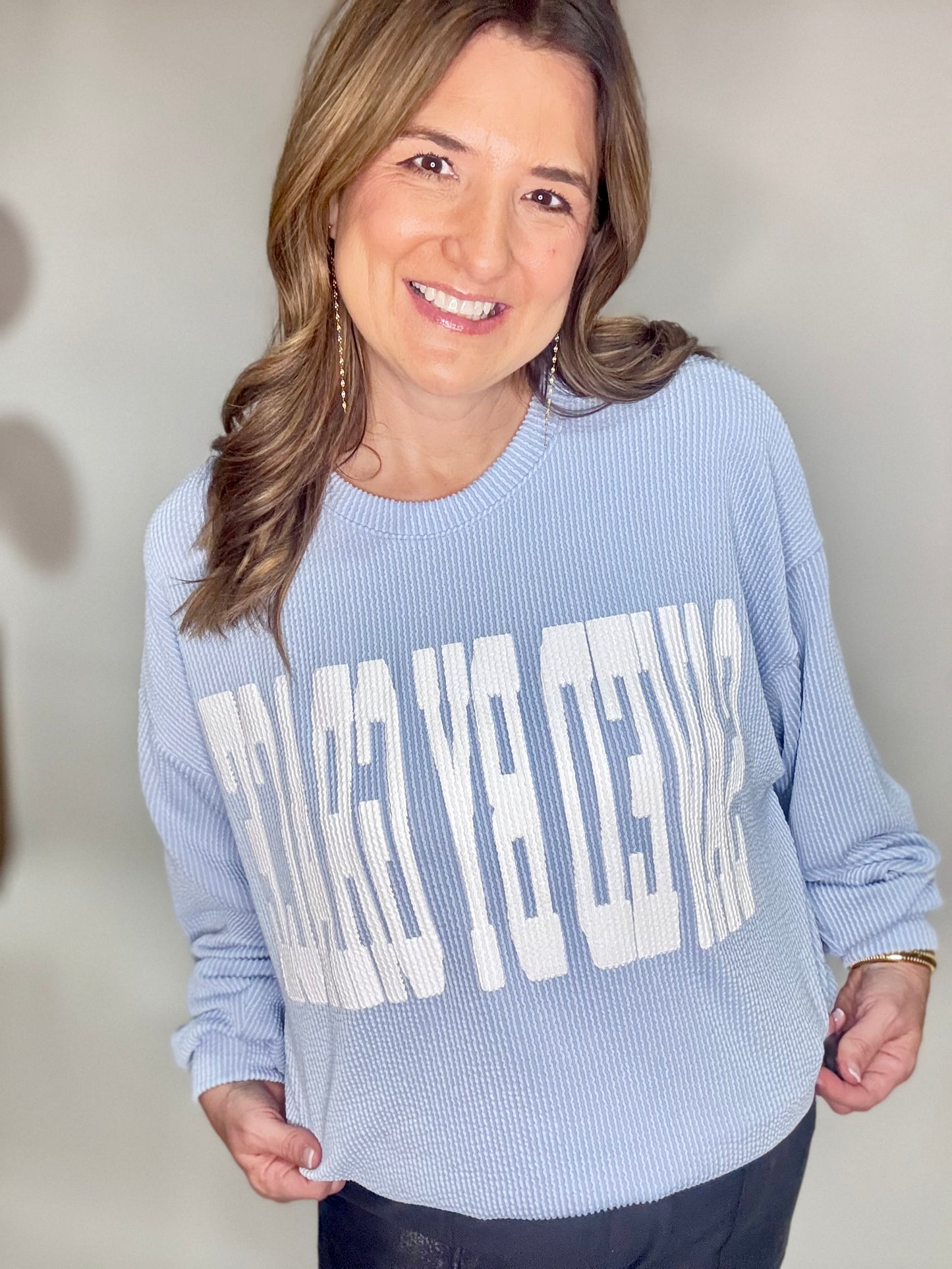 The Saved By Grace Baby Blue Sweatshirt.