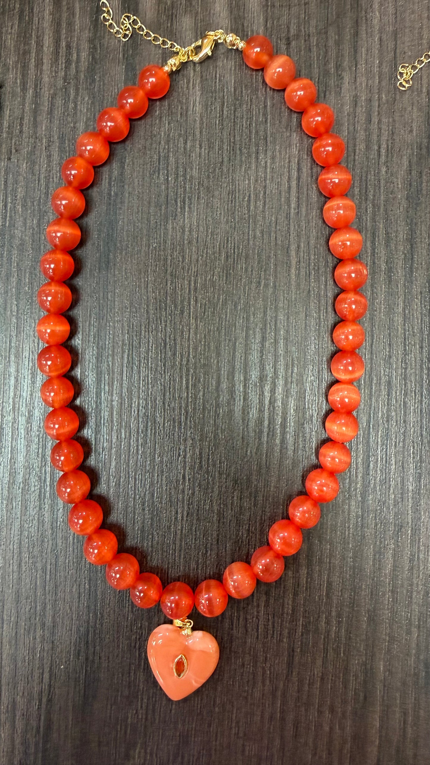 Pre-order orange beaded necklace cats eye stone with marble orange heart charm