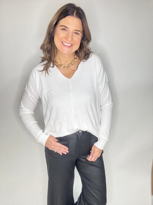 The White V-Neck Sweater