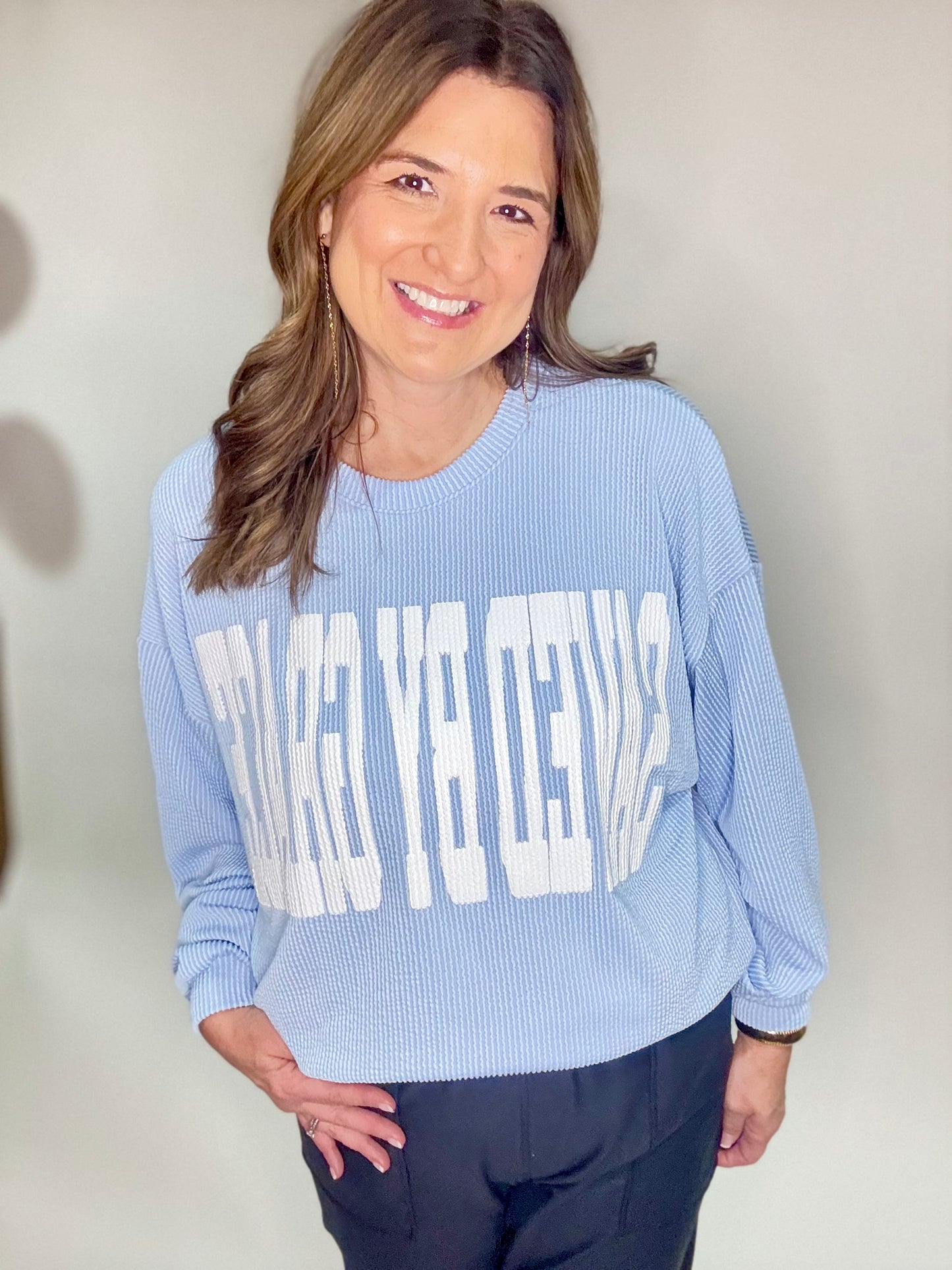 The Saved By Grace Baby Blue Sweatshirt.
