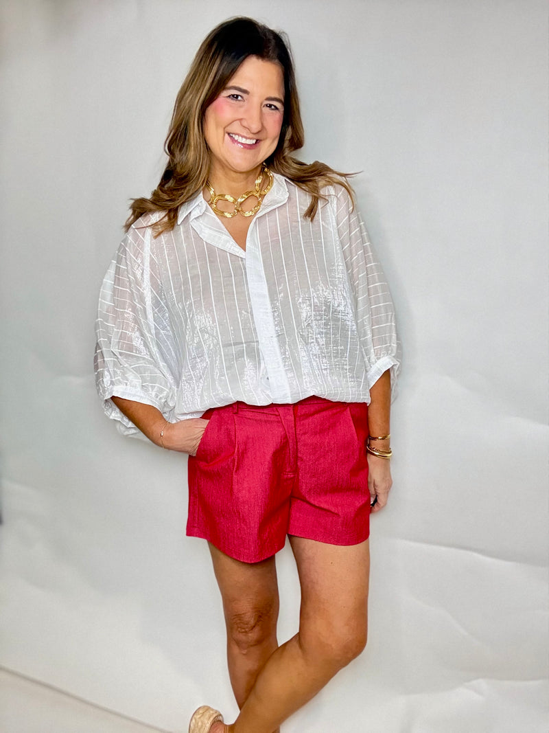 The Shiny White Blouse